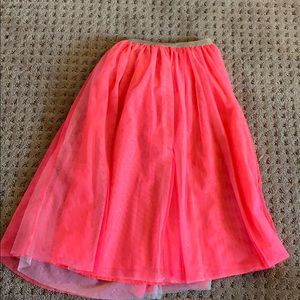 Pink and gold strap on the top